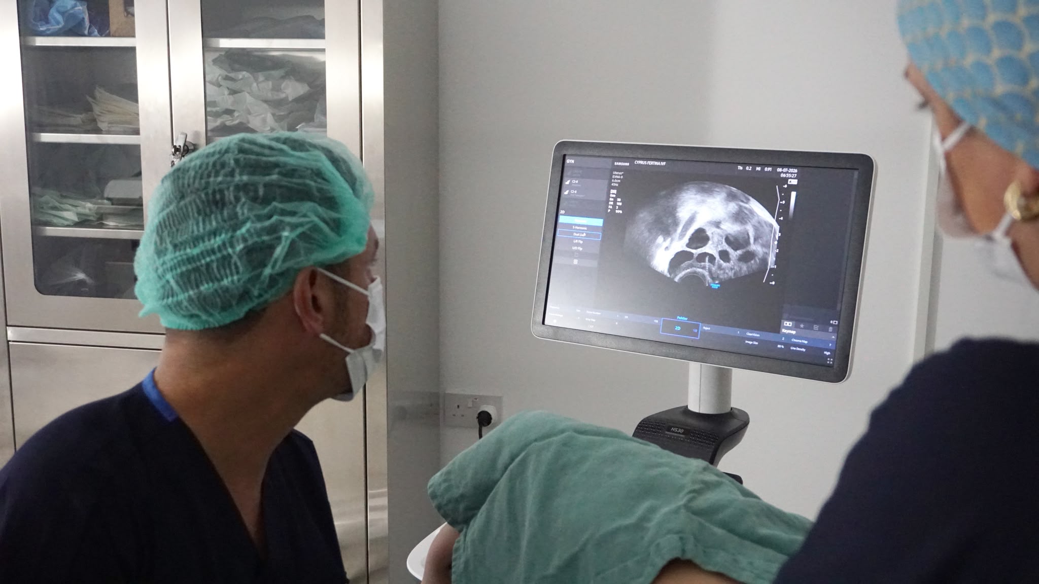 Dr. Sever reviewing an ultrasound scan at Fertina IVF